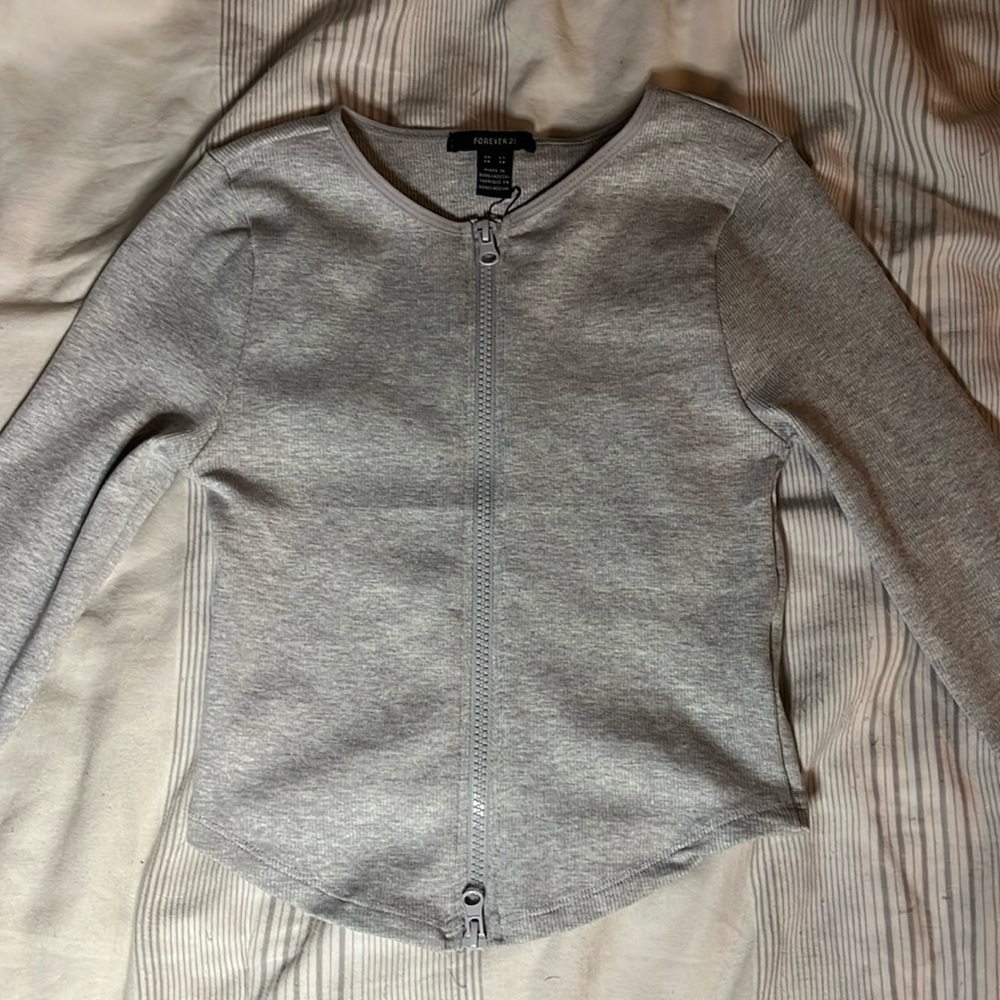 grey zip up (tight)